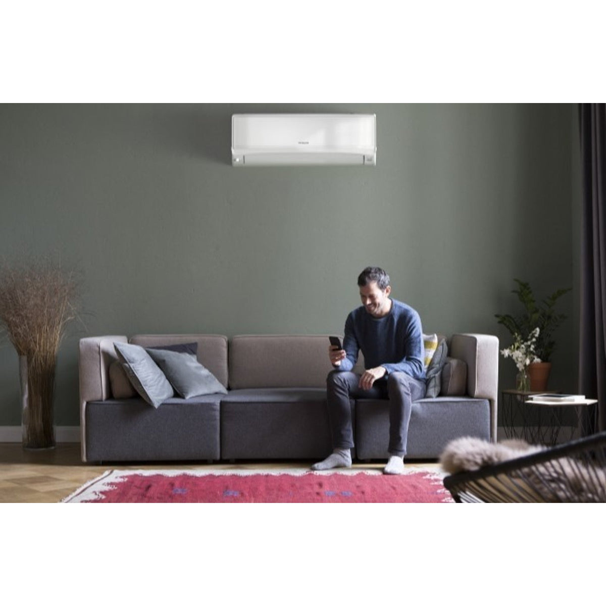 Hitachi airHome 600 wall unit installed in a living room